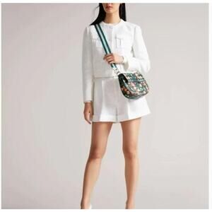 Ted Baker London Parcell Magnolia print leather crossbody bag